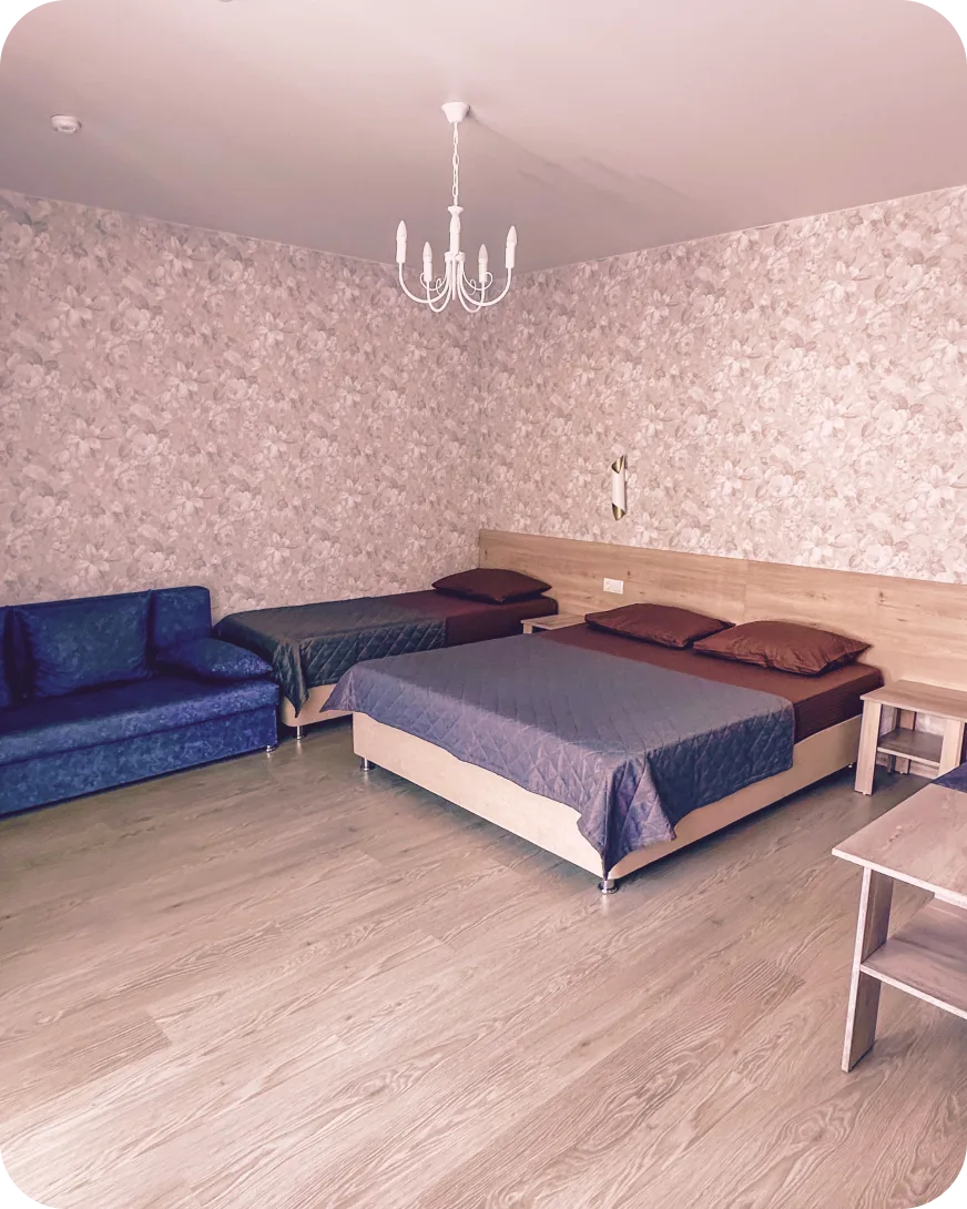 Номер Премиум+ - роскошный номер с двуспальной кроватью и диваном